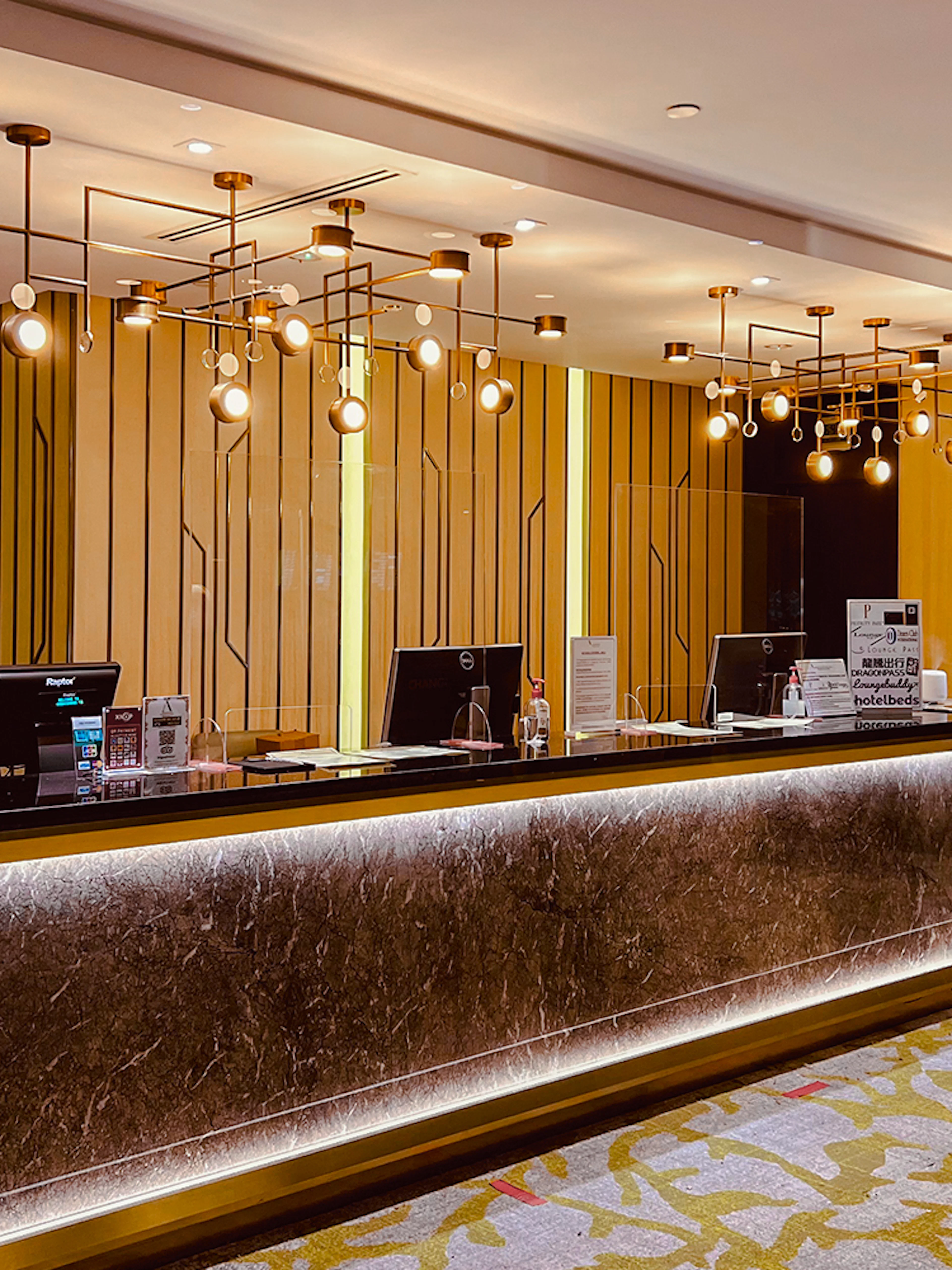 Reception desk at Ambassador Transit Lounge, Terminal 3, Changi Airport.