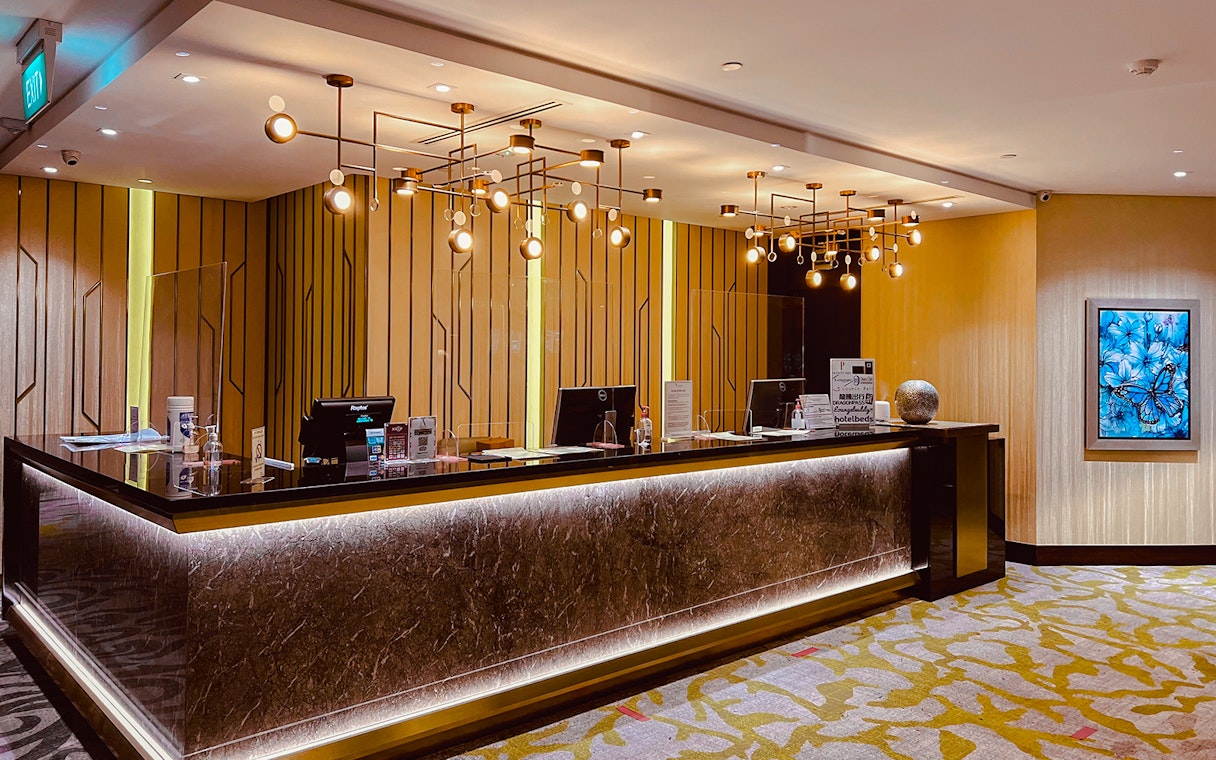 Reception desk at Ambassador Transit Lounge, Terminal 3, Changi Airport.