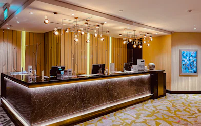 Reception desk at Ambassador Transit Lounge, Terminal 3, Changi Airport.