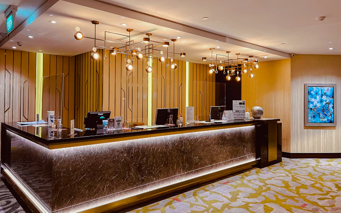 Reception desk at Ambassador Transit Lounge, Terminal 3, Changi Airport.