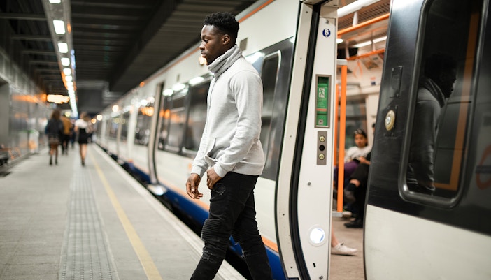 man getting off subway