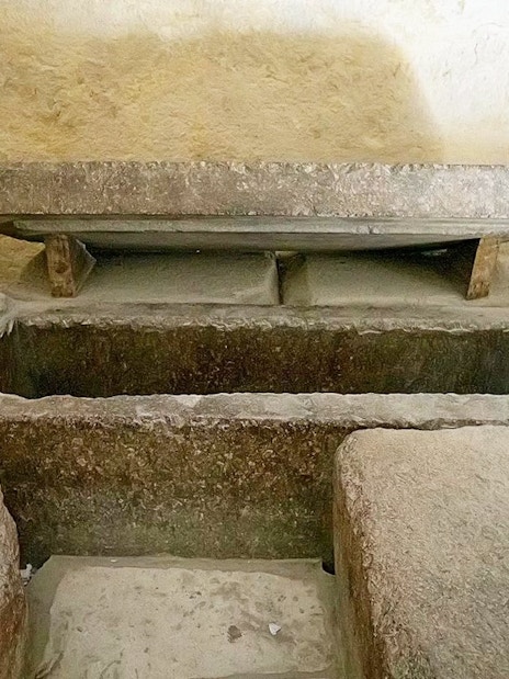 Burial chamber with stone sarcophagus inside Pyramid of Khafre, Giza, Cairo day trip from Hurghada.