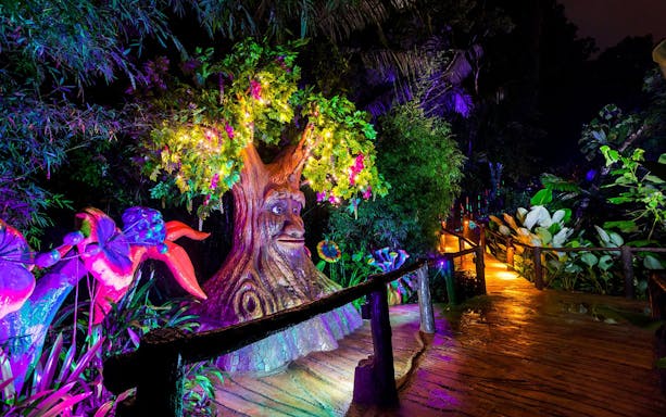 Colorful illuminated tree sculpture at Lost World of Tambun's Hot Springs & Night Park.