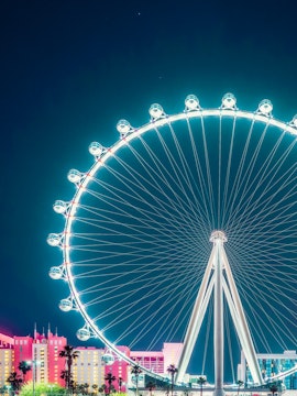 High Roller Ferris Wheel illuminated at night in Las Vegas.