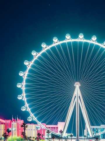 High Roller Ferris Wheel illuminated at night in Las Vegas.