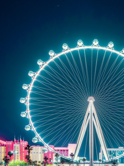 High Roller Ferris Wheel illuminated at night in Las Vegas.
