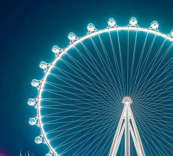 High Roller Ferris Wheel illuminated at night in Las Vegas.