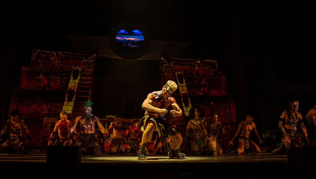 Performers in traditional costumes on stage during "MALINCHE, un musical de Nacho Cano.