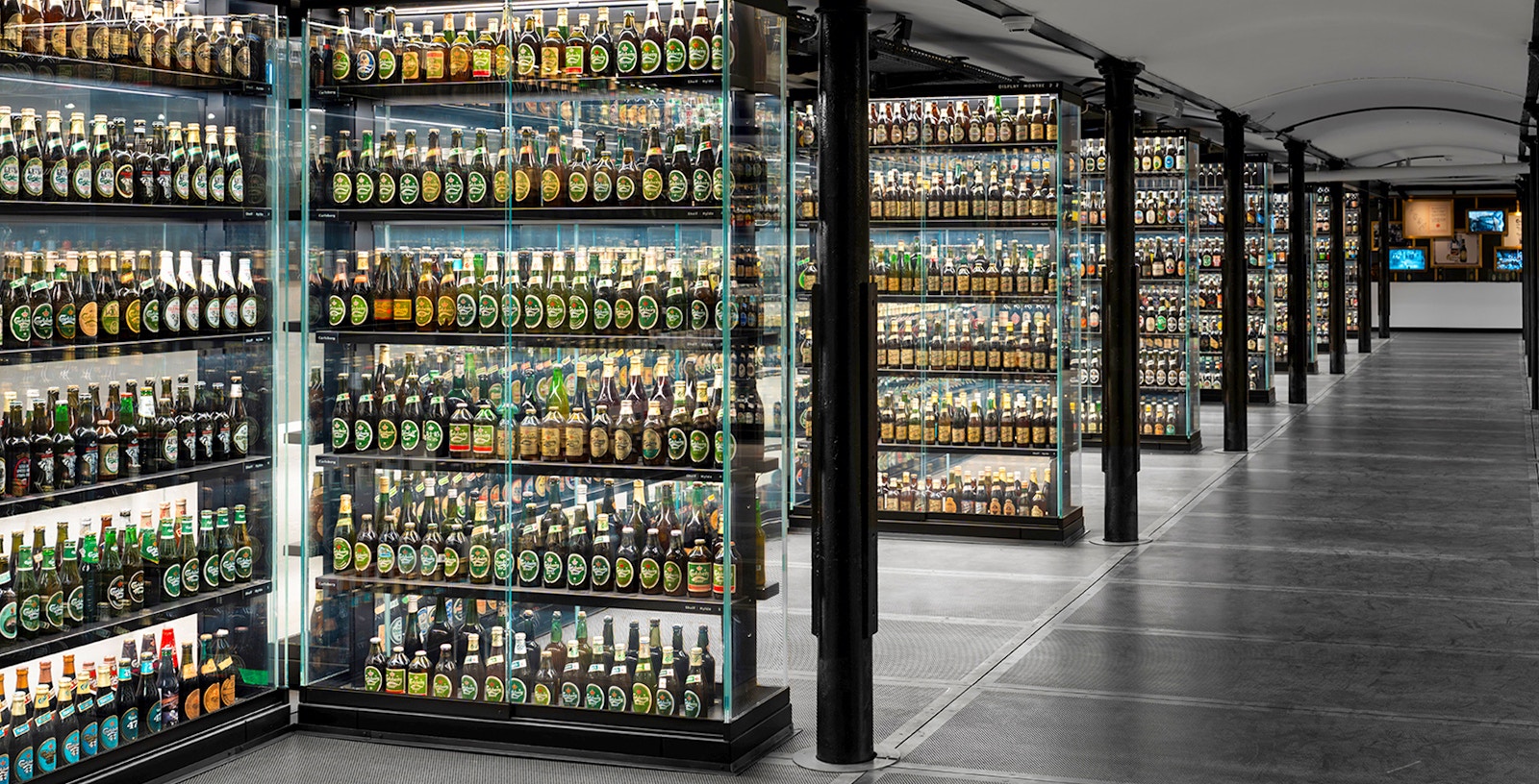 Exhibit inside Home of Carlsberg, showcasing historical brewing artifacts in Copenhagen, Denmark.
