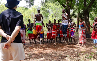Maasai dancers performing traditional jump dance in Diani Beach, Kenya.