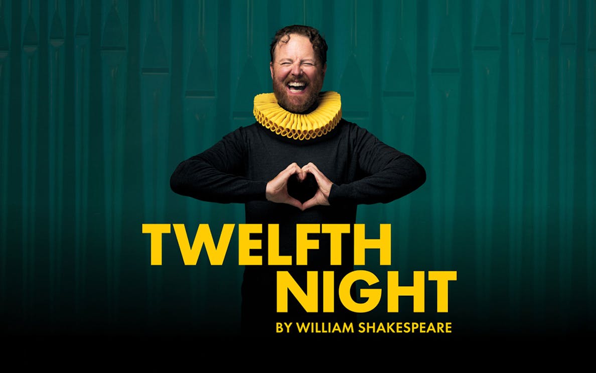 Actor in a ruff collar promoting Shakespeare's "Twelfth Night" play.
