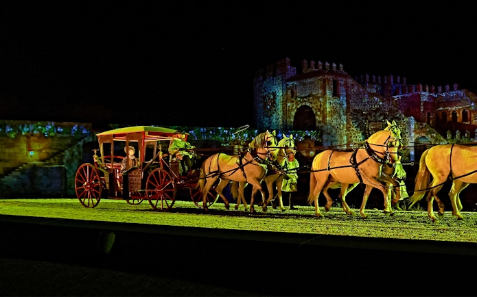 Horse-drawn carriage in The Dream of Toledo night show, Spain.