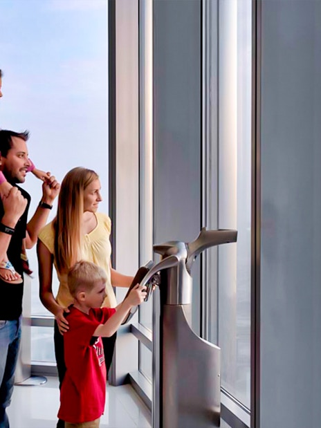 Visitors enjoying the view from Burj Khalifa's Level 124 observation deck.