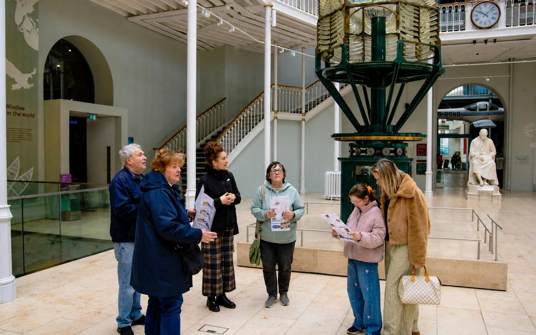 Visitors on a guided tour at the National Museum of Scotland in Edinburgh.
