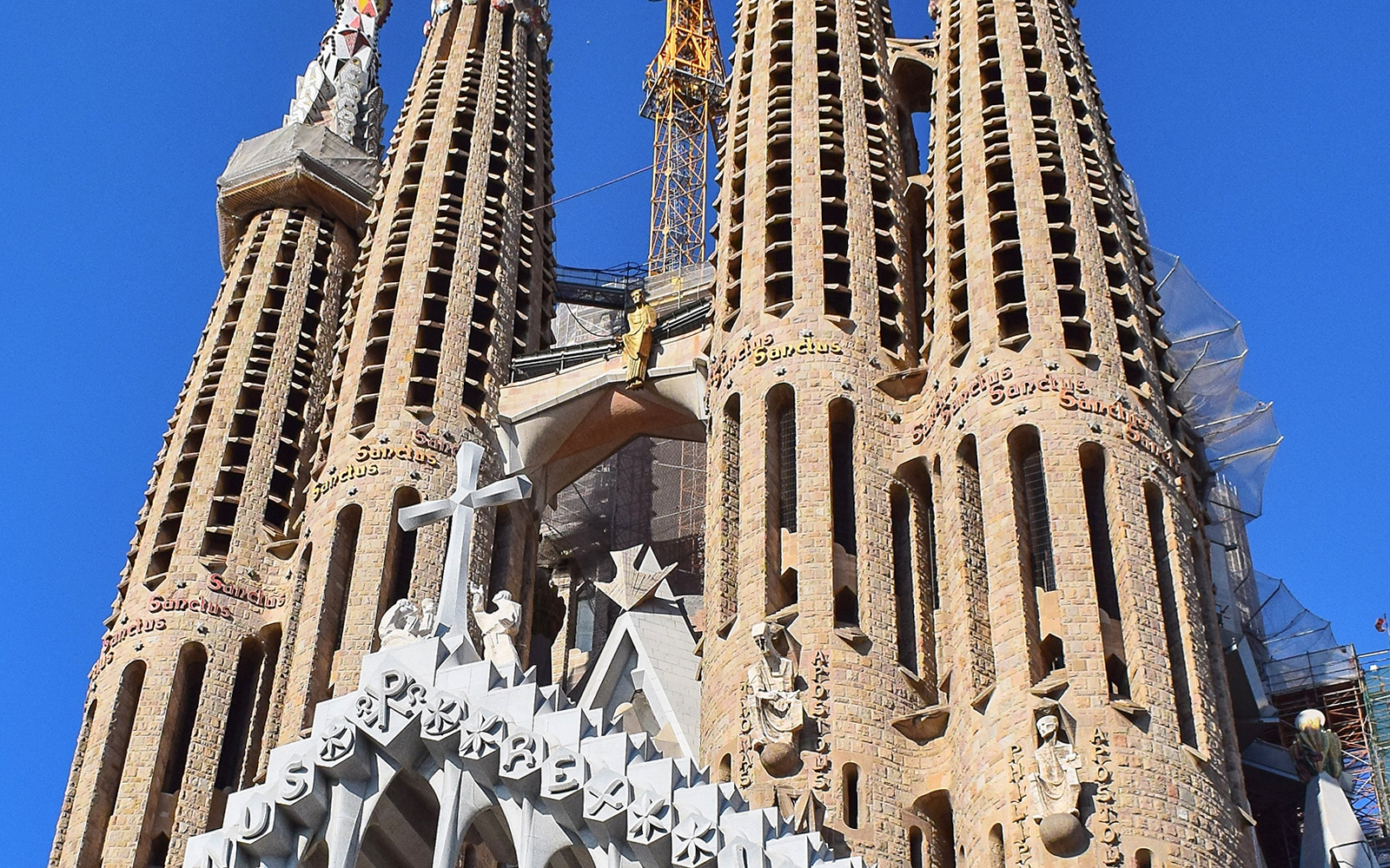Sagrada Familia's high towers and detailed facades in Barcelona.