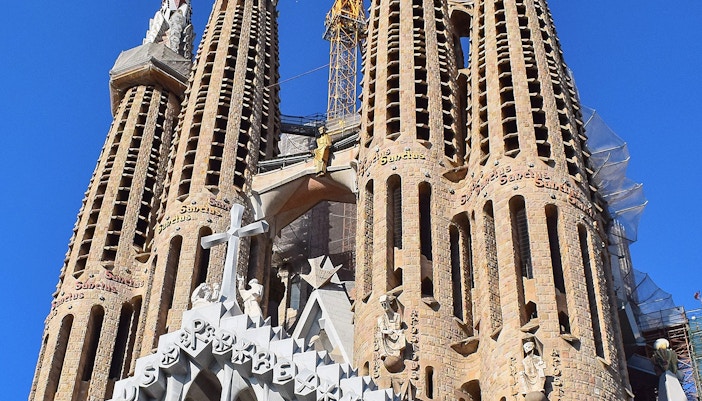 Sagrada Familia's high towers and detailed facades in Barcelona.