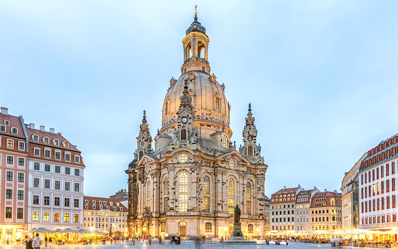 Frauenkirche Dresden illuminated at dusk during guided gallery tour.
