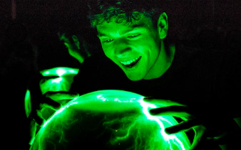 Person interacting with Crackle Ball at Camera Obscura & World of Illusions, Edinburgh.