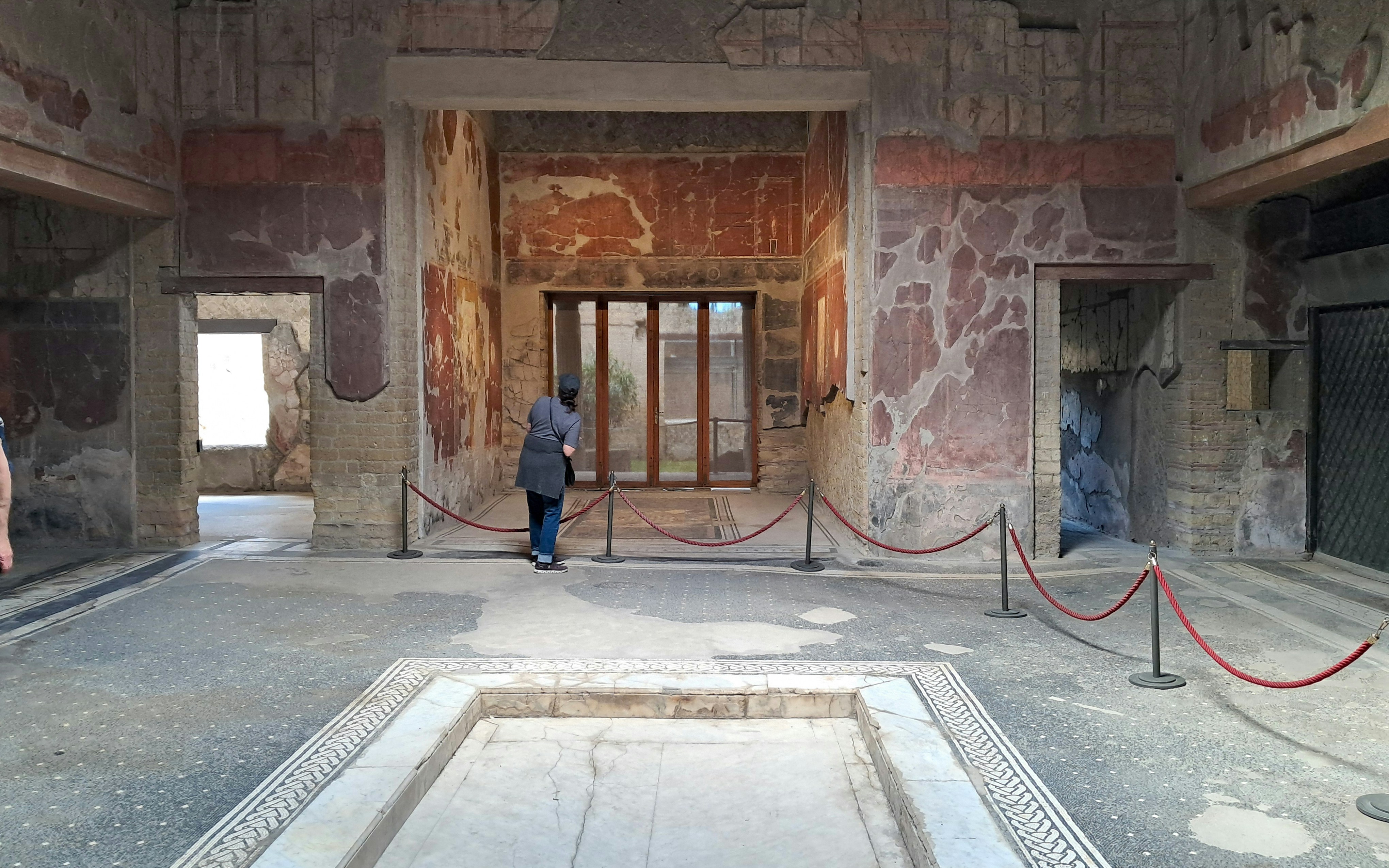Samnite House interior with ancient frescoes in Herculaneum, Italy.
