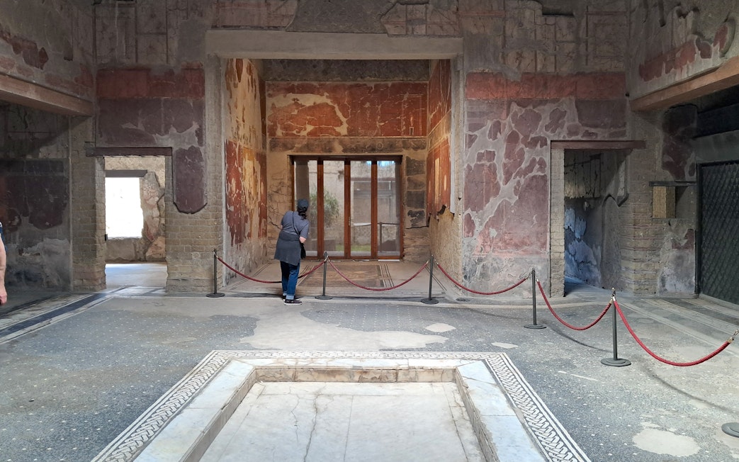 Samnite House interior with ancient frescoes in Herculaneum, Italy.
