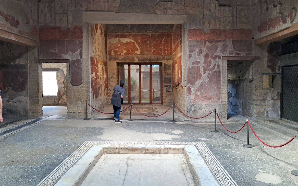 Samnite House interior with ancient frescoes in Herculaneum, Italy.