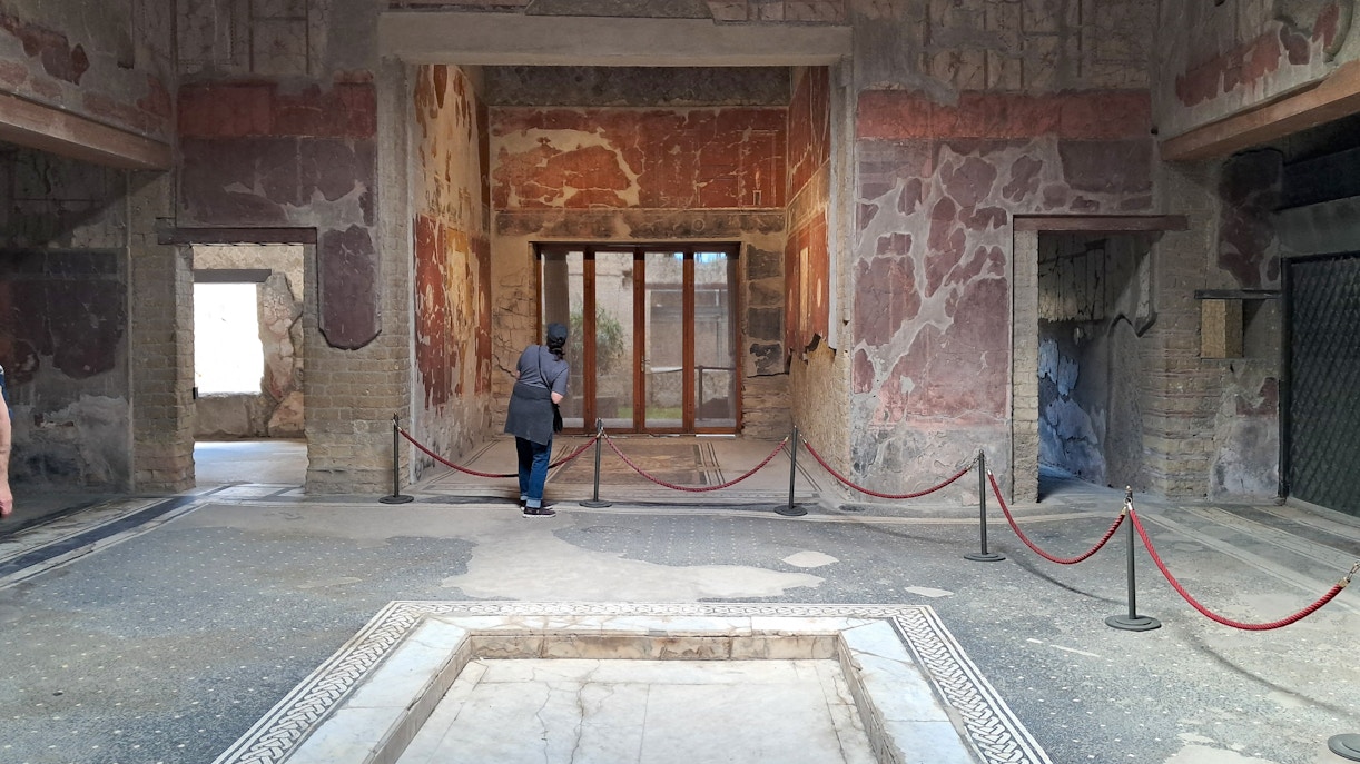 Samnite House interior with ancient frescoes in Herculaneum, Italy.