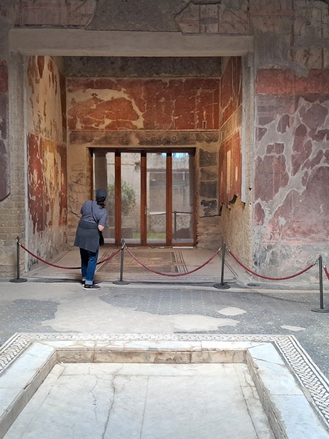 Samnite House interior with ancient frescoes in Herculaneum, Italy.