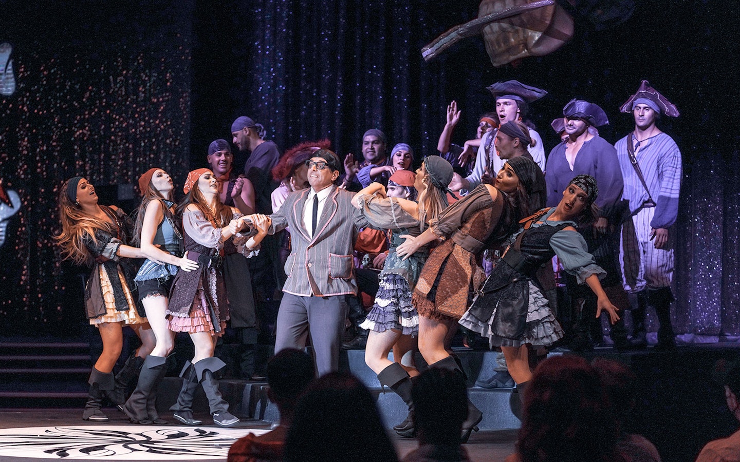 Performers in pirate costumes on stage during WOW: The Vegas Spectacular show.