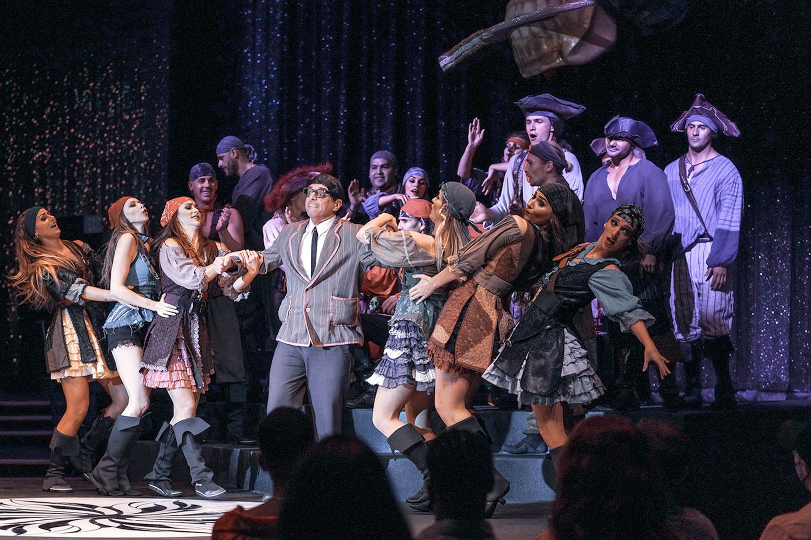 Performers in pirate costumes on stage during WOW: The Vegas Spectacular show.
