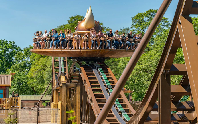 Visitors on a spinning ride at Drayton Manor theme park.