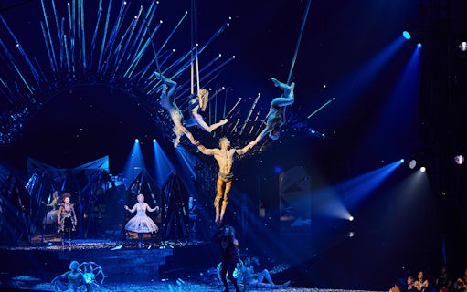 Acrobats performing aerial stunts at Cirque du Soleil: Alegría in Seville.