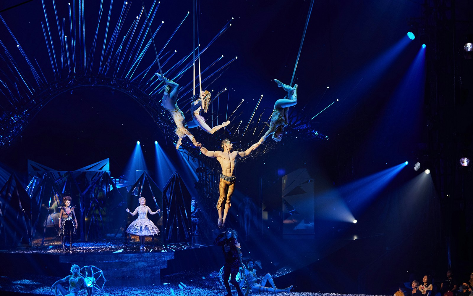 Acrobats performing aerial stunts at Cirque du Soleil: Alegría in Seville.