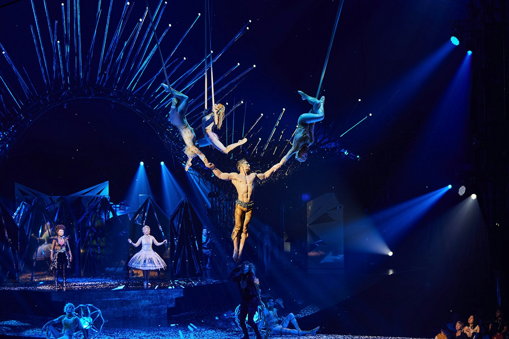 Acrobats performing aerial stunts at Cirque du Soleil: Alegría in Seville.