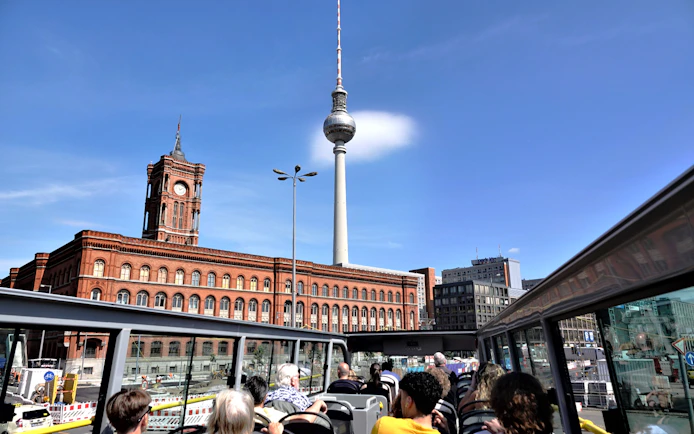 TV tower and red brick building viewed from City Circle Hop-On Hop-Off bus in Berlin.