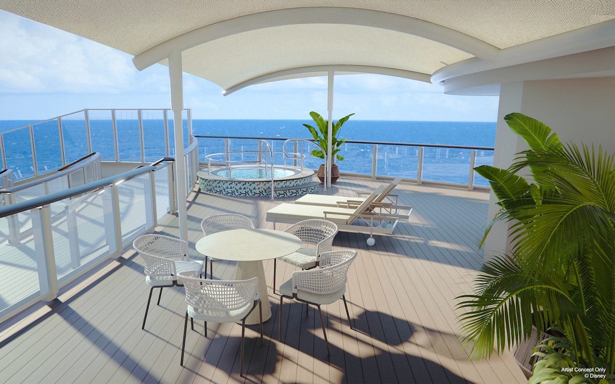 Oceanview verandah with seating and hot tub on Disney Adventure Cruise.