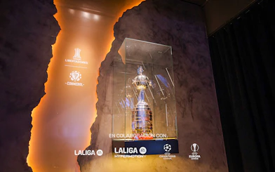Trophy display at Legends of Football Museum featuring CONMEBOL Libertadores Cup.
