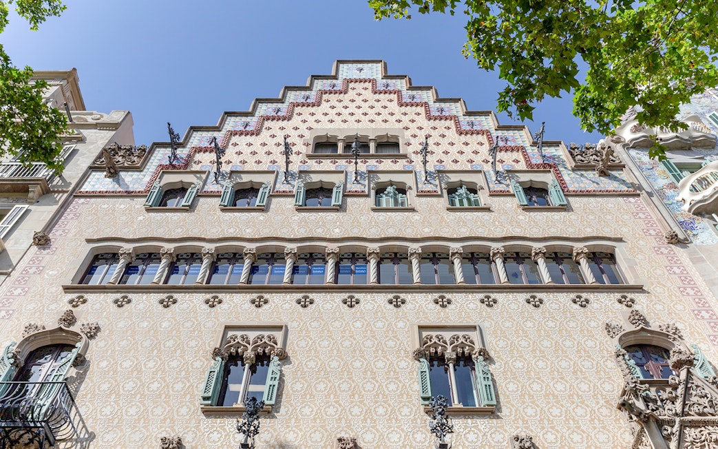 Facade of Casa Amatller in Barcelona, showcasing intricate architectural details.