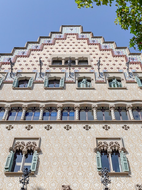 Facade of Casa Amatller in Barcelona, showcasing intricate architectural details.