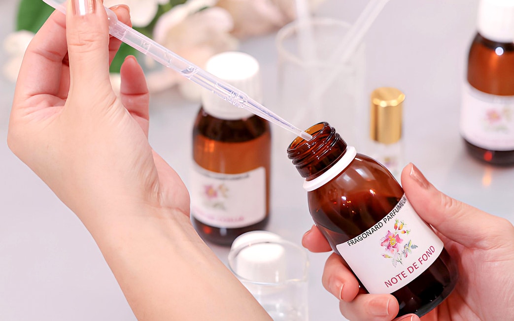 Perfume mixing at Fragonard Perfume Museum workshop in Paris.