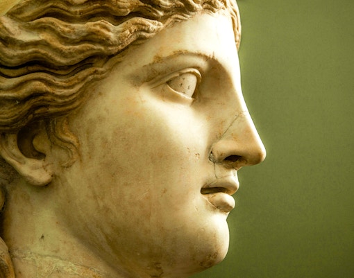 Restoration Sculpture exhibit at a museum in Florence, Italy, showcasing intricate marble carvings.