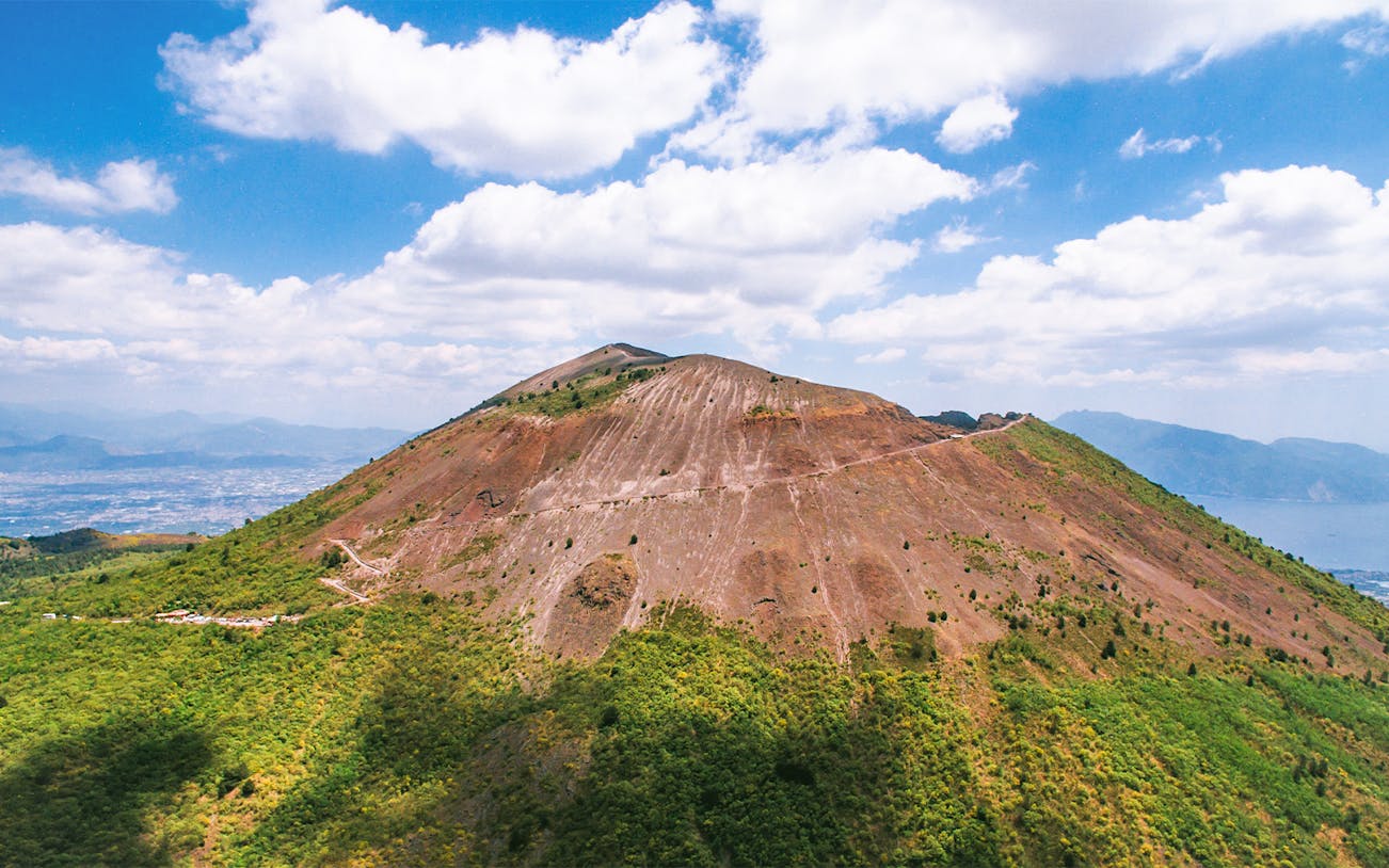 Mount Vesuvius crater view with surrounding landscape, Italy.