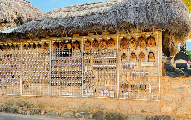 Traditional Korean masks displayed at a shop in Korean Folk Village near Seoul.