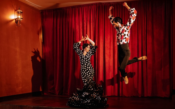 Flamenco dancers performing on stage at Laietana, Barcelona.