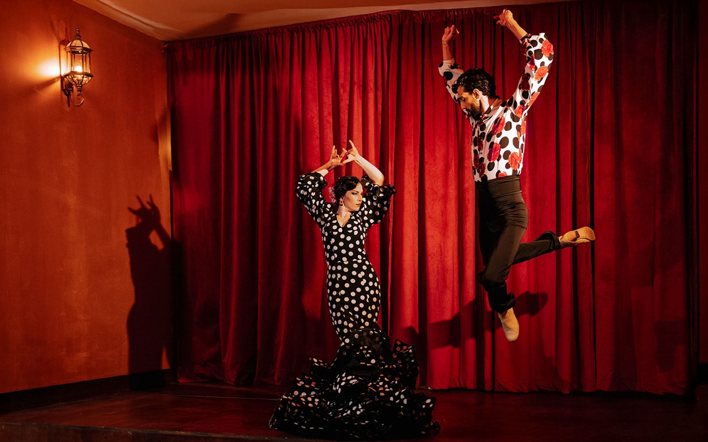 Flamenco dancers performing on stage at Laietana, Barcelona.