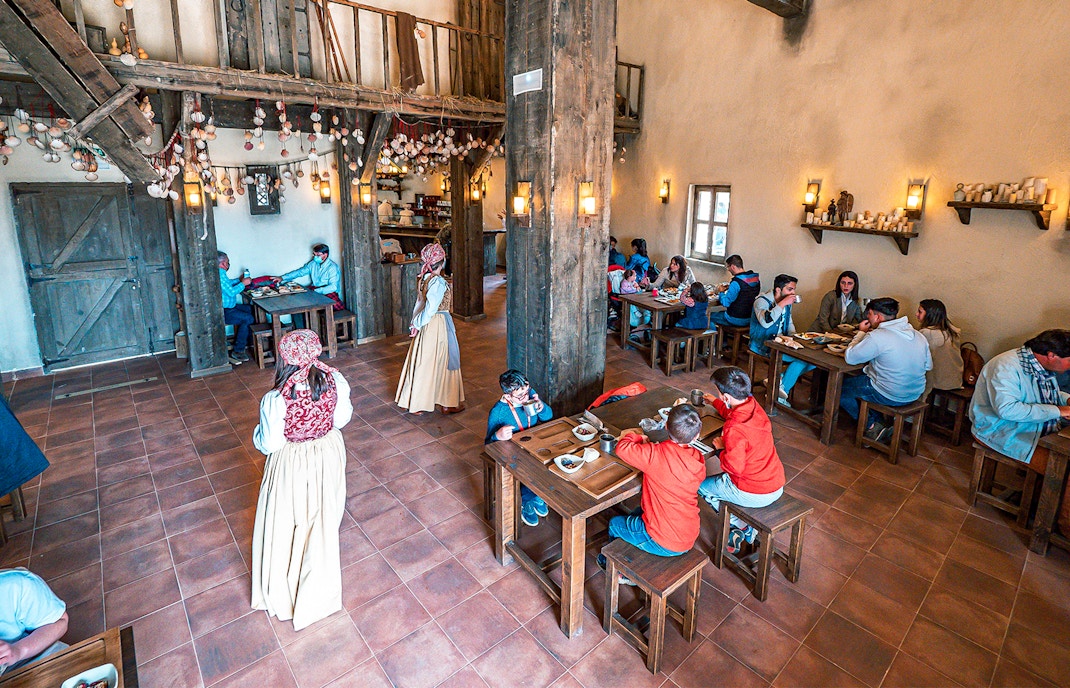 El Salon Califal interior at Puy du Fou, showcasing intricate arches and detailed Moorish architecture.