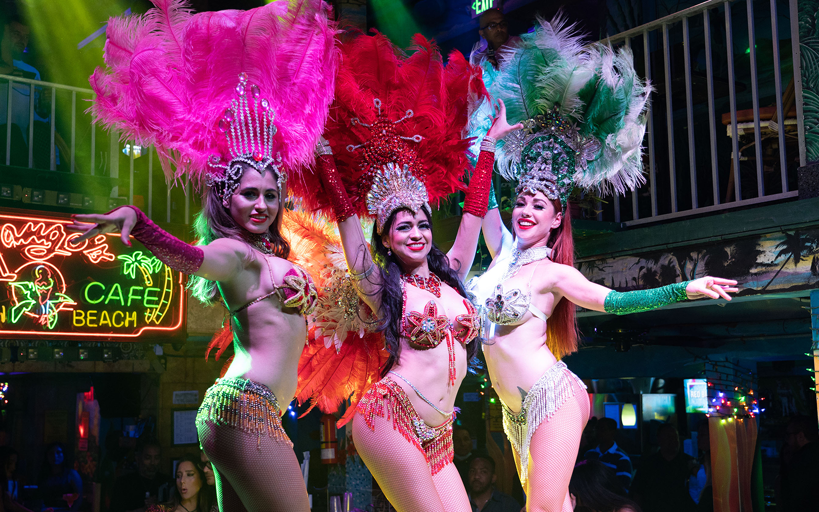 Salsa dancers performing at a vibrant Miami nightclub.