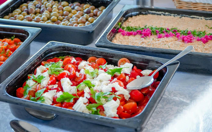 Tomato and feta salad on brunch buffet during Vilamoura tour in Algarve.