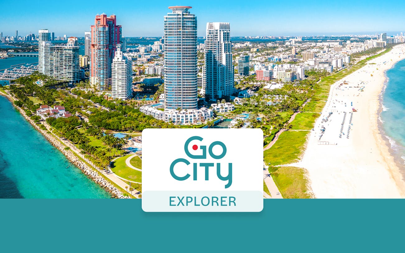 Miami skyline with beach and Go City Explorer Pass logo.