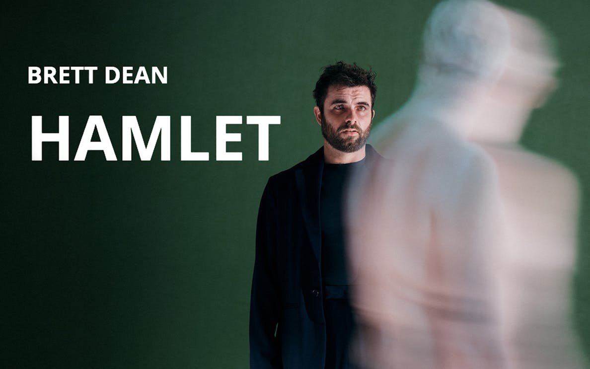 Brett Dean's Hamlet performance with blurred figure in foreground.