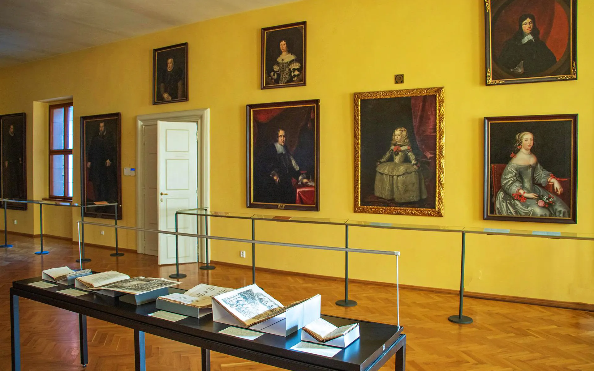 Paintings and historical books displayed at Lobkowicz Palace Museum, Prague.